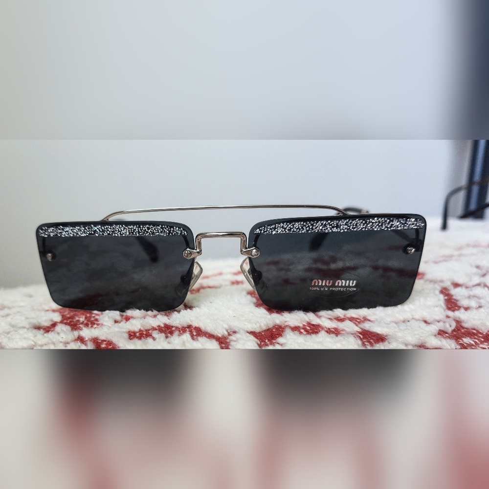 Miu MiuSOCIETY Black and Sparkle sunglasses